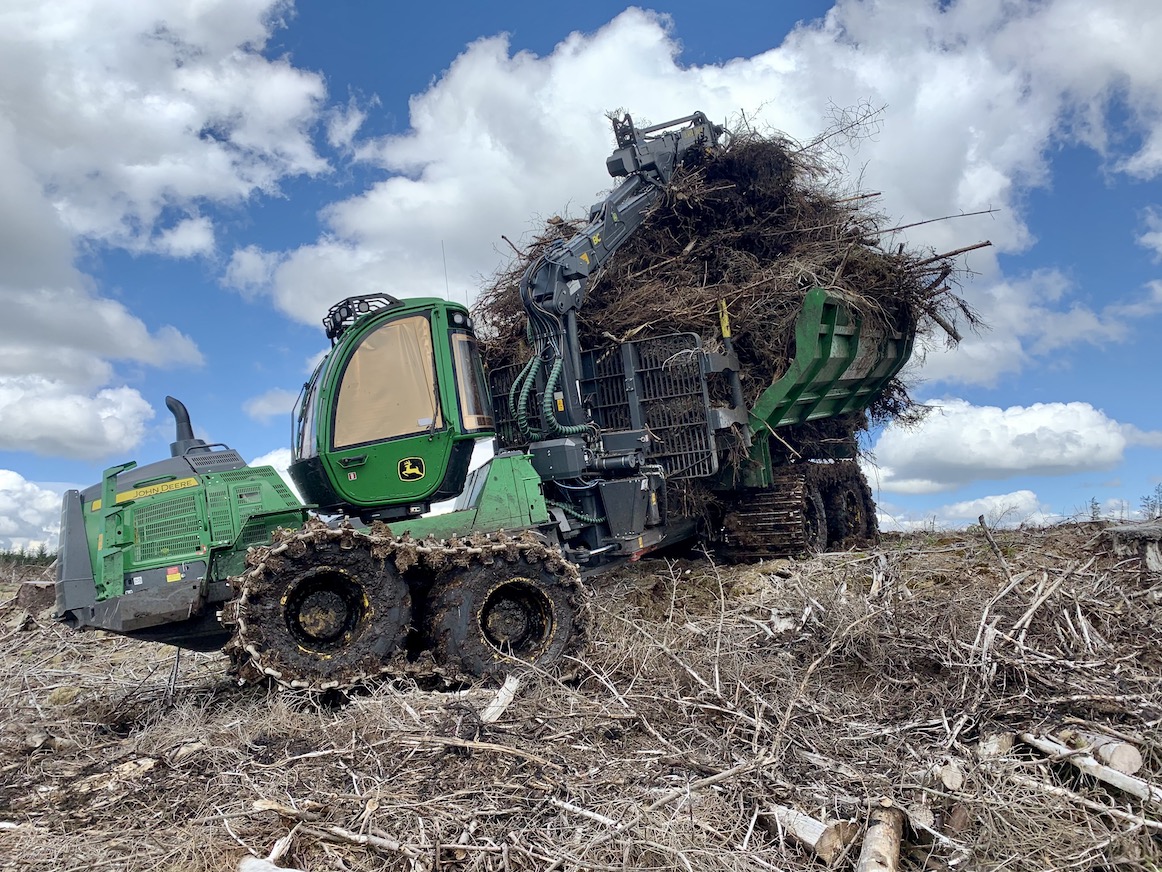 Above: Our forwarder collecting brash from the forestry