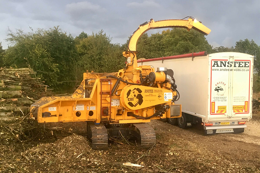 Above: Chipping directly into our top loading walking floor trailer ready for transport across Wales and beyond